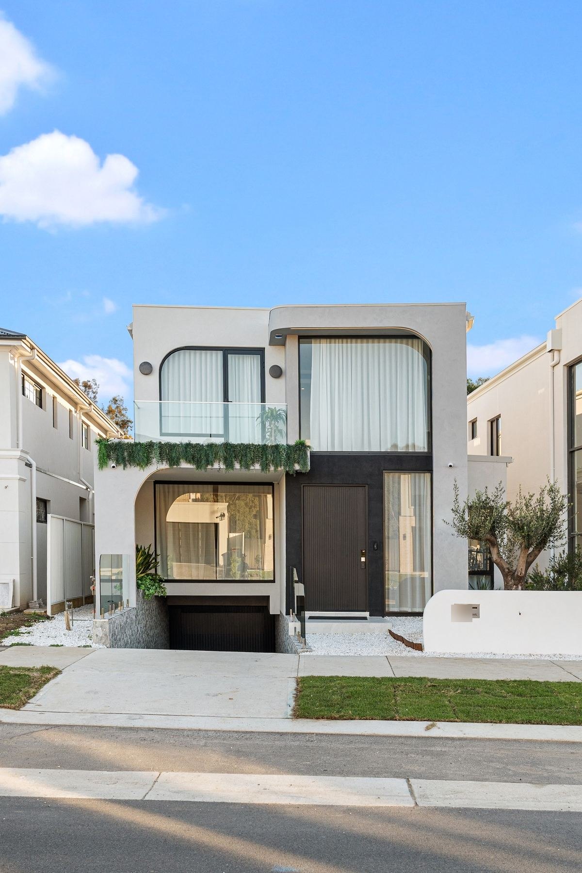 Entry of the completed custom home in Gledswood Hills