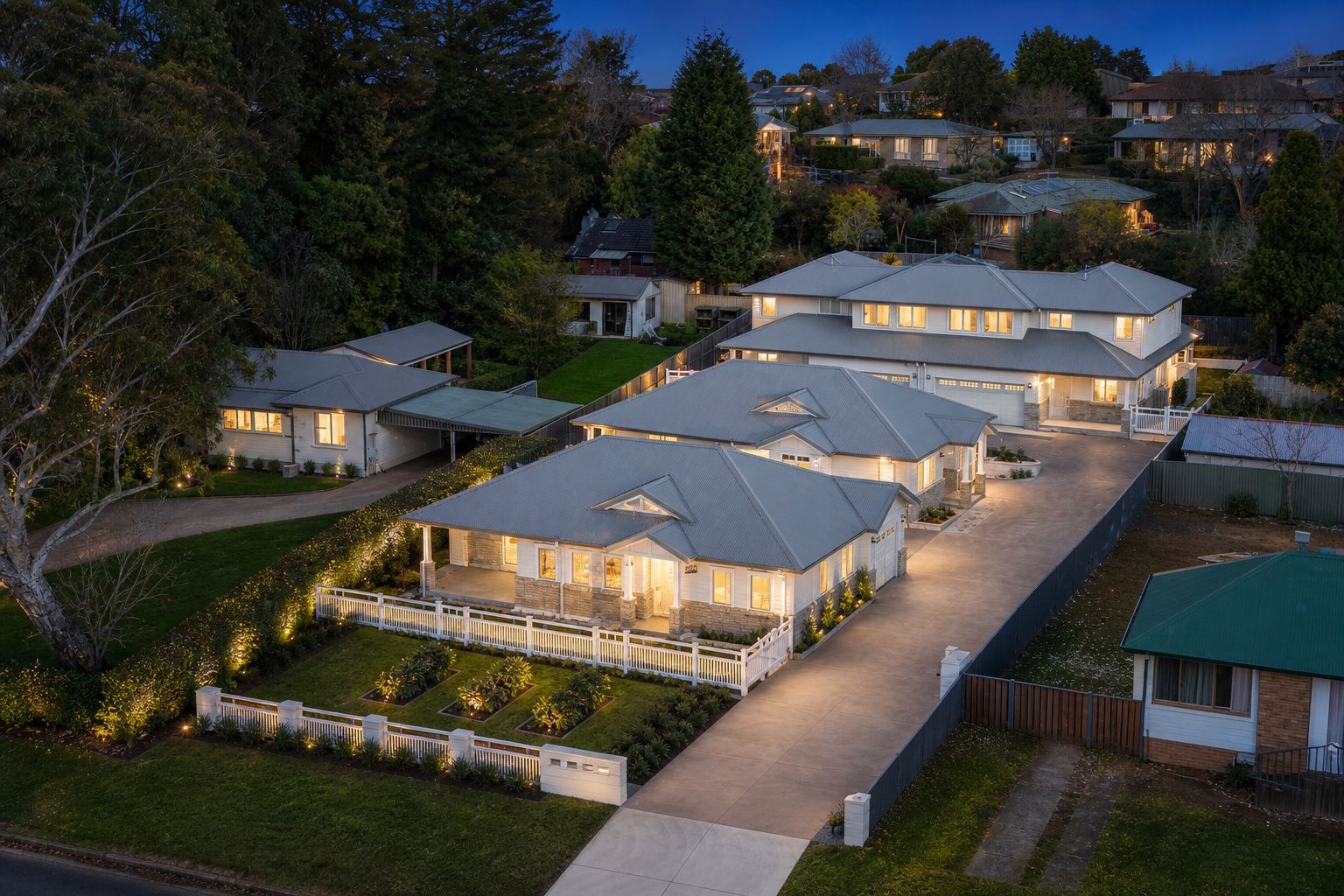 Four completed homes at Mittagong at dusk